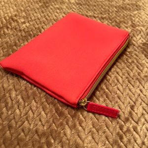 Neon hot pink Sephora makeup bag